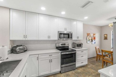 Experience the epitome of modern elegance in this fully on Hunters Run Golf and Country Club in Florida - for sale on GolfHomes.com, golf home, golf lot