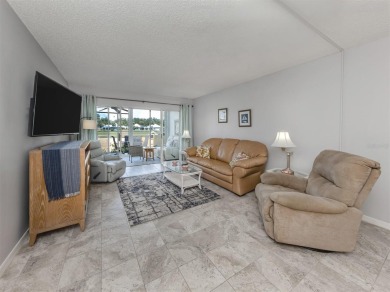 Light and bright ground floor two-bedroom, two-bath home enjoys on Plantation Golf and Country Club in Florida - for sale on GolfHomes.com, golf home, golf lot