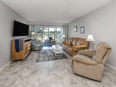 Light and bright ground floor two-bedroom, two-bath home enjoys on Plantation Golf and Country Club in Florida - for sale on GolfHomes.com, golf home, golf lot
