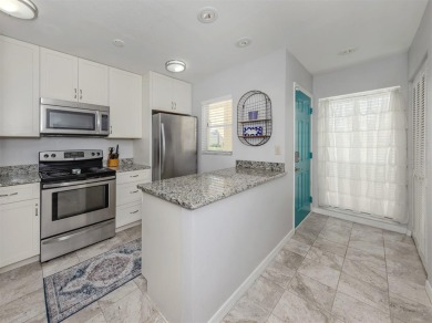 Light and bright ground floor two-bedroom, two-bath home enjoys on Plantation Golf and Country Club in Florida - for sale on GolfHomes.com, golf home, golf lot