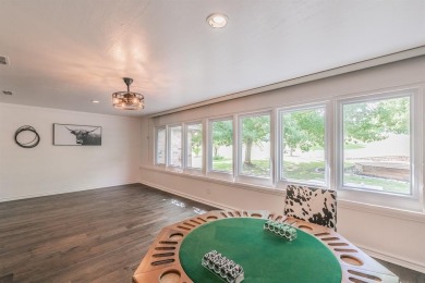 Welcome to this beautifully updated home located in the on De Cordova Bend Country Club in Texas - for sale on GolfHomes.com, golf home, golf lot
