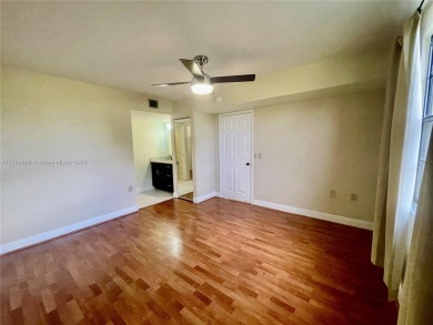Spacious 2 bed 2 bath plus extra room! Clean & Bright unit on The Country Club At Boca Raton in Florida - for sale on GolfHomes.com, golf home, golf lot