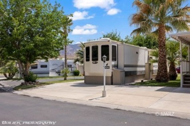 This unique property offers a stunning view lot situated on Beaver Dam Resort in Arizona - for sale on GolfHomes.com, golf home, golf lot