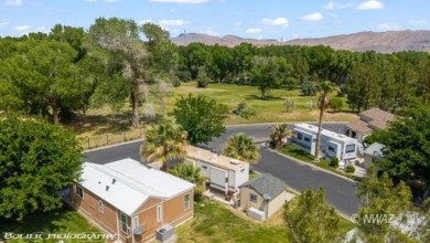 This unique property offers a stunning view lot situated on Beaver Dam Resort in Arizona - for sale on GolfHomes.com, golf home, golf lot