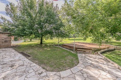 Welcome to this beautifully updated home located in the on De Cordova Bend Country Club in Texas - for sale on GolfHomes.com, golf home, golf lot