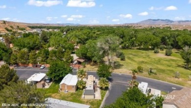This unique property offers a stunning view lot situated on Beaver Dam Resort in Arizona - for sale on GolfHomes.com, golf home, golf lot