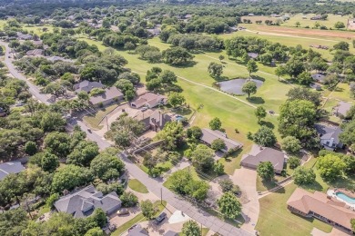 Welcome to this beautifully updated home located in the on De Cordova Bend Country Club in Texas - for sale on GolfHomes.com, golf home, golf lot
