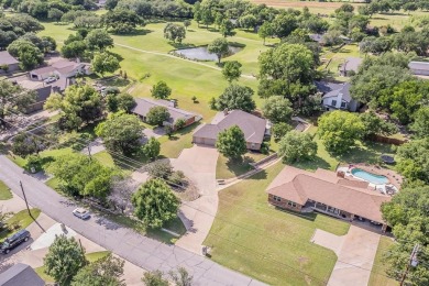 Welcome to this beautifully updated home located in the on De Cordova Bend Country Club in Texas - for sale on GolfHomes.com, golf home, golf lot