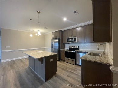 This beautiful three bedroom, two bathroom luxury condo in on Anderson Creek Golf Club in North Carolina - for sale on GolfHomes.com, golf home, golf lot