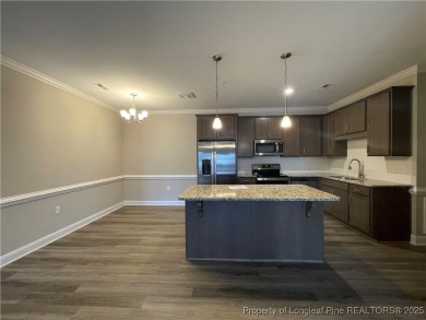 This beautiful three bedroom, two bathroom luxury condo in on Anderson Creek Golf Club in North Carolina - for sale on GolfHomes.com, golf home, golf lot