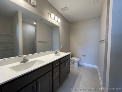 This beautiful three bedroom, two bathroom luxury condo in on Anderson Creek Golf Club in North Carolina - for sale on GolfHomes.com, golf home, golf lot