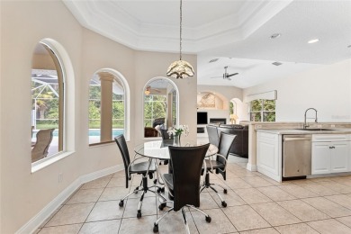 Welcome to 68 Egret Trail - A Golf Course Pool Home in the Heart on The Grand Club Cypress Course in Florida - for sale on GolfHomes.com, golf home, golf lot