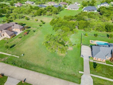 Build your dream home on 1.3 acres in an established on Tangle Ridge Golf Club in Texas - for sale on GolfHomes.com, golf home, golf lot