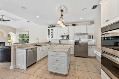 Welcome to 68 Egret Trail - A Golf Course Pool Home in the Heart on The Grand Club Cypress Course in Florida - for sale on GolfHomes.com, golf home, golf lot