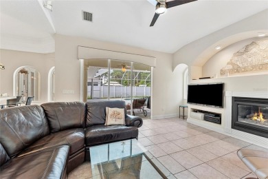 Welcome to 68 Egret Trail - A Golf Course Pool Home in the Heart on The Grand Club Cypress Course in Florida - for sale on GolfHomes.com, golf home, golf lot