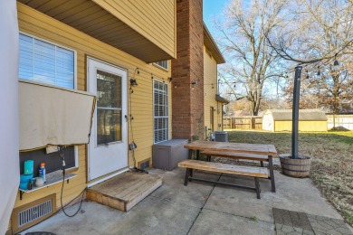 This lovely home with great curb appeal is awaiting its new on Horton Smith Golf Course in Missouri - for sale on GolfHomes.com, golf home, golf lot