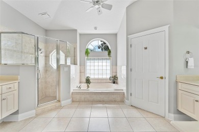 Welcome to 68 Egret Trail - A Golf Course Pool Home in the Heart on The Grand Club Cypress Course in Florida - for sale on GolfHomes.com, golf home, golf lot