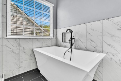 Welcome to this meticulously maintained 4-bedroom home in the on Golf Club At Wescott Plantation in South Carolina - for sale on GolfHomes.com, golf home, golf lot