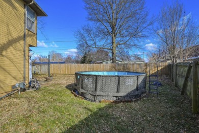 This lovely home with great curb appeal is awaiting its new on Horton Smith Golf Course in Missouri - for sale on GolfHomes.com, golf home, golf lot