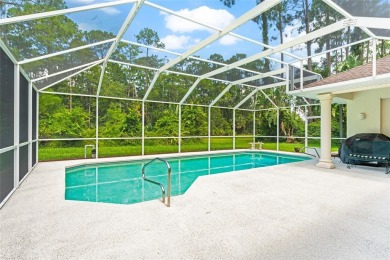 Welcome to 68 Egret Trail - A Golf Course Pool Home in the Heart on The Grand Club Cypress Course in Florida - for sale on GolfHomes.com, golf home, golf lot