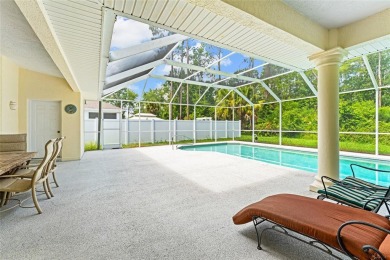 Welcome to 68 Egret Trail - A Golf Course Pool Home in the Heart on The Grand Club Cypress Course in Florida - for sale on GolfHomes.com, golf home, golf lot