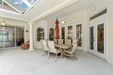 Welcome to 68 Egret Trail - A Golf Course Pool Home in the Heart on The Grand Club Cypress Course in Florida - for sale on GolfHomes.com, golf home, golf lot