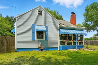 Nestled on a spacious .73-acre lot, this 3-bedroom, 1-bath Cape on Rocky Lakes Golf Course in Ohio - for sale on GolfHomes.com, golf home, golf lot