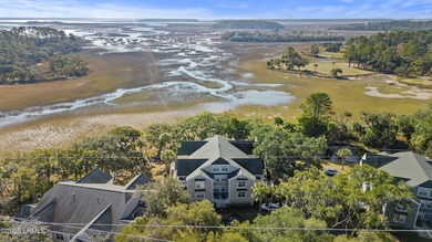Enjoy serene panoramic marsh views from this beautifully updated on Old South Golf Links in South Carolina - for sale on GolfHomes.com, golf home, golf lot