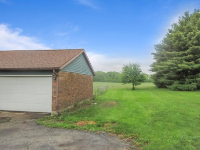 Charming Brick Ranch on 1.73 Acres with Scenic Views. Discover on White Springs Golf Course in Ohio - for sale on GolfHomes.com, golf home, golf lot