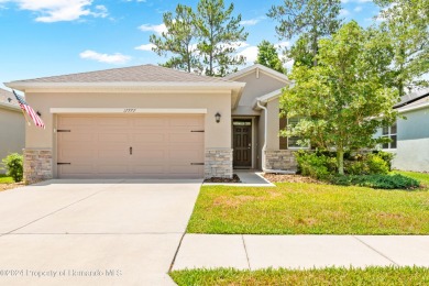 This home is situated in the Hernando Oaks golf community on Hernando Oaks Golf and Country Club in Florida - for sale on GolfHomes.com, golf home, golf lot