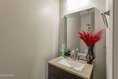 4 bedrooms,2.5 baths formal and family dining and living room on The Golf Club At Johnson Ranch in Arizona - for sale on GolfHomes.com, golf home, golf lot