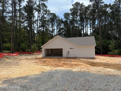 Now available and nearing completion, the 'Lindie' single level on Foxfire Golf and Country Club in North Carolina - for sale on GolfHomes.com, golf home, golf lot