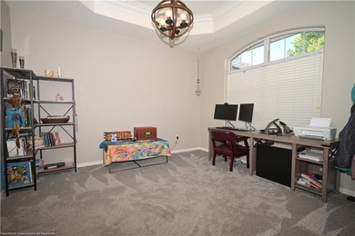 Welcome to this beautiful Pool home overlooking the Turtle Run on Sun n Lake Golf and Country Club in Florida - for sale on GolfHomes.com, golf home, golf lot