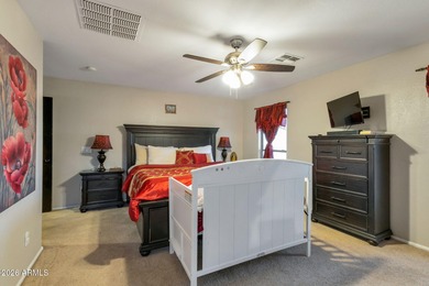 4 bedrooms,2.5 baths formal and family dining and living room on The Golf Club At Johnson Ranch in Arizona - for sale on GolfHomes.com, golf home, golf lot