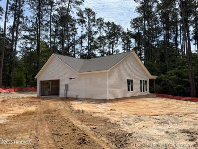 Now available and nearing completion, the 'Lindie' single level on Foxfire Golf and Country Club in North Carolina - for sale on GolfHomes.com, golf home, golf lot