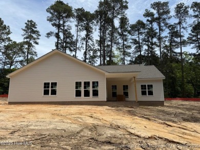 Now available and nearing completion, the 'Lindie' single level on Foxfire Golf and Country Club in North Carolina - for sale on GolfHomes.com, golf home, golf lot