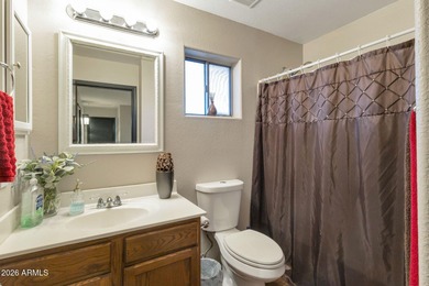 4 bedrooms,2.5 baths formal and family dining and living room on The Golf Club At Johnson Ranch in Arizona - for sale on GolfHomes.com, golf home, golf lot