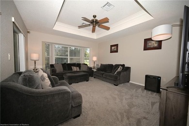 Welcome to this beautiful Pool home overlooking the Turtle Run on Sun n Lake Golf and Country Club in Florida - for sale on GolfHomes.com, golf home, golf lot