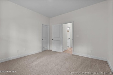 Now available and nearing completion, the 'Lindie' single level on Foxfire Golf and Country Club in North Carolina - for sale on GolfHomes.com, golf home, golf lot