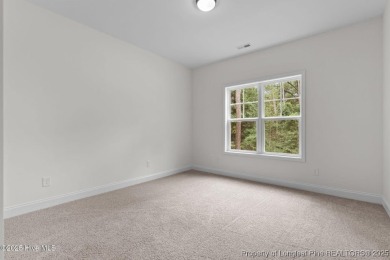 Now available and nearing completion, the 'Lindie' single level on Foxfire Golf and Country Club in North Carolina - for sale on GolfHomes.com, golf home, golf lot