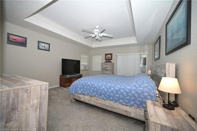 Welcome to this beautiful Pool home overlooking the Turtle Run on Sun n Lake Golf and Country Club in Florida - for sale on GolfHomes.com, golf home, golf lot