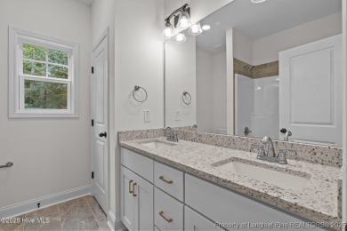 Now available and nearing completion, the 'Lindie' single level on Foxfire Golf and Country Club in North Carolina - for sale on GolfHomes.com, golf home, golf lot