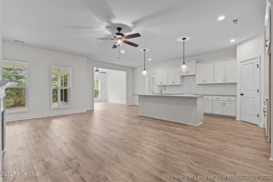 Now available and nearing completion, the 'Lindie' single level on Foxfire Golf and Country Club in North Carolina - for sale on GolfHomes.com, golf home, golf lot
