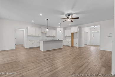 Now available and nearing completion, the 'Lindie' single level on Foxfire Golf and Country Club in North Carolina - for sale on GolfHomes.com, golf home, golf lot