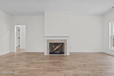 Now available and nearing completion, the 'Lindie' single level on Foxfire Golf and Country Club in North Carolina - for sale on GolfHomes.com, golf home, golf lot