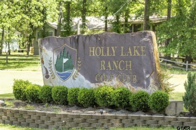 Experience the enchanting rhythm of nature year-round in this on Holly Lake Ranch Golf Club in Texas - for sale on GolfHomes.com, golf home, golf lot