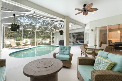 Welcome to 9303 Wellington, a beautifully updated 4-bedroom on Hunters Green Country Club in Florida - for sale on GolfHomes.com, golf home, golf lot