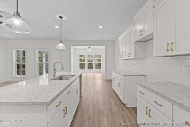 Now available and nearing completion, the 'Lindie' single level on Foxfire Golf and Country Club in North Carolina - for sale on GolfHomes.com, golf home, golf lot