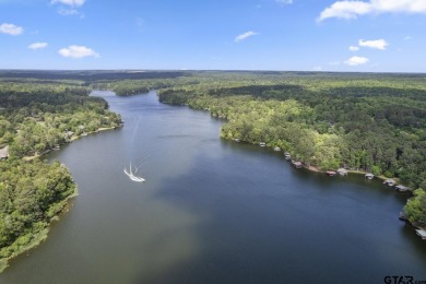 Experience the enchanting rhythm of nature year-round in this on Holly Lake Ranch Golf Club in Texas - for sale on GolfHomes.com, golf home, golf lot