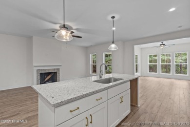 Now available and nearing completion, the 'Lindie' single level on Foxfire Golf and Country Club in North Carolina - for sale on GolfHomes.com, golf home, golf lot